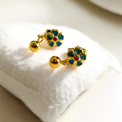 Delicate Sweet Flower Enamel Drop Earrings, available in 18K Gold Plated. Crafted from stainless steel, these earrings feature a charming floral design with a total size of 14.4mm x 6.2mm x 3mm and a total weight of 2g. Hypoallergenic, tarnish-free, water-resistant, and built for durability, these earrings offer effortless elegance. Delivered in a Sutra Designs custom jewelry packet for a premium experience
