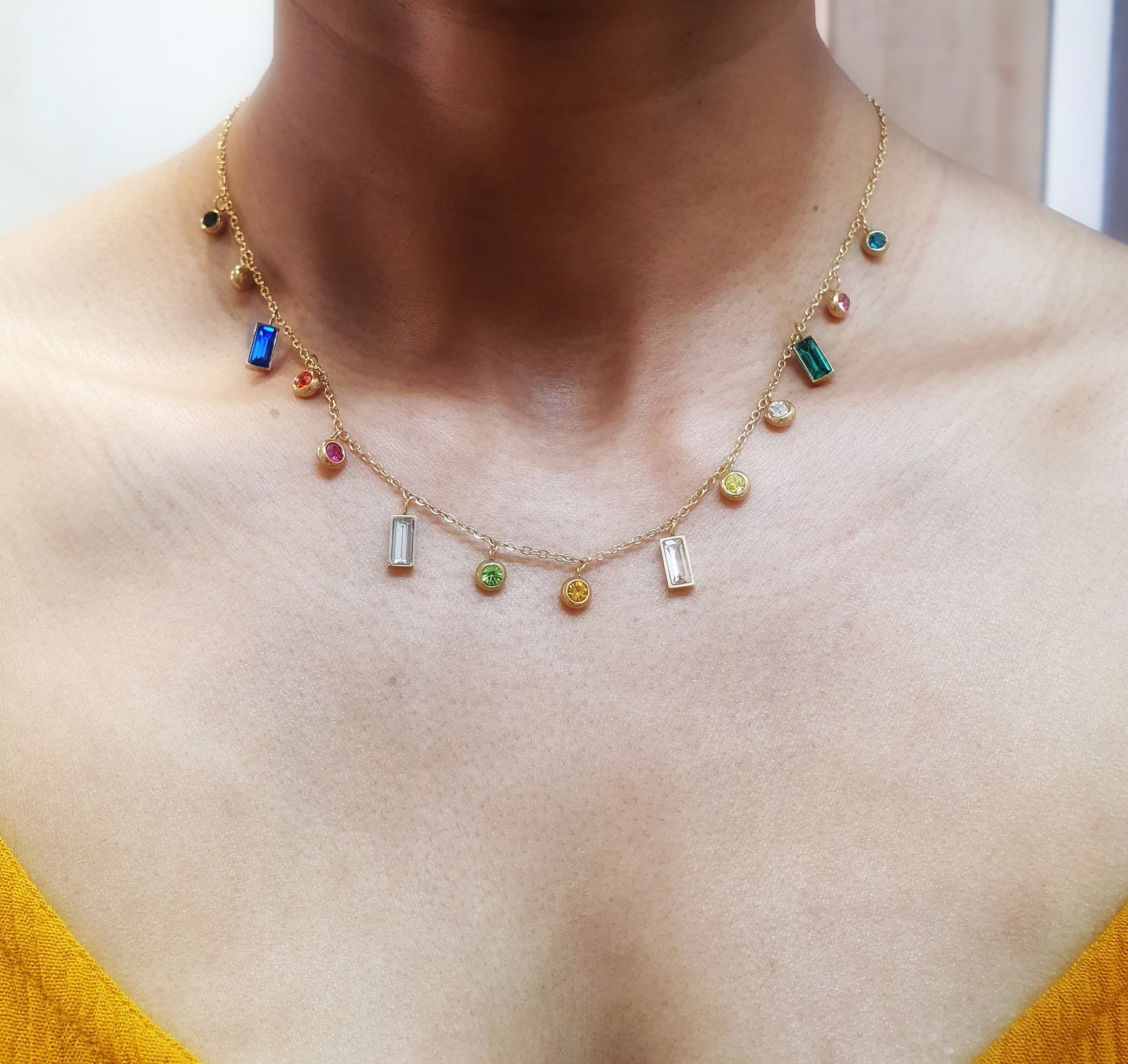 Elegant color block natural stone necklace with gold-plated titanium steel accents, adjustable from 41 cm + 5 cm, and weighing 4g. Hypoallergenic, tarnish-free, and water-resistant, this necklace offers exceptional durability and comes in Sutra Designs’ custom jewelry packaging
