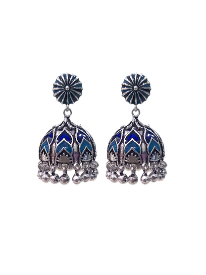 Beautiful Ela enamel jhumka earrings in antique silver, crafted from brass and enamel, designed to elevate your ethnic and festive look. Measuring 4 cm x 2 cm x 1 cm and weighing 28g, these skin-friendly earrings come in Sutra Designs’ custom jewelry packaging, perfect for traditional celebrations