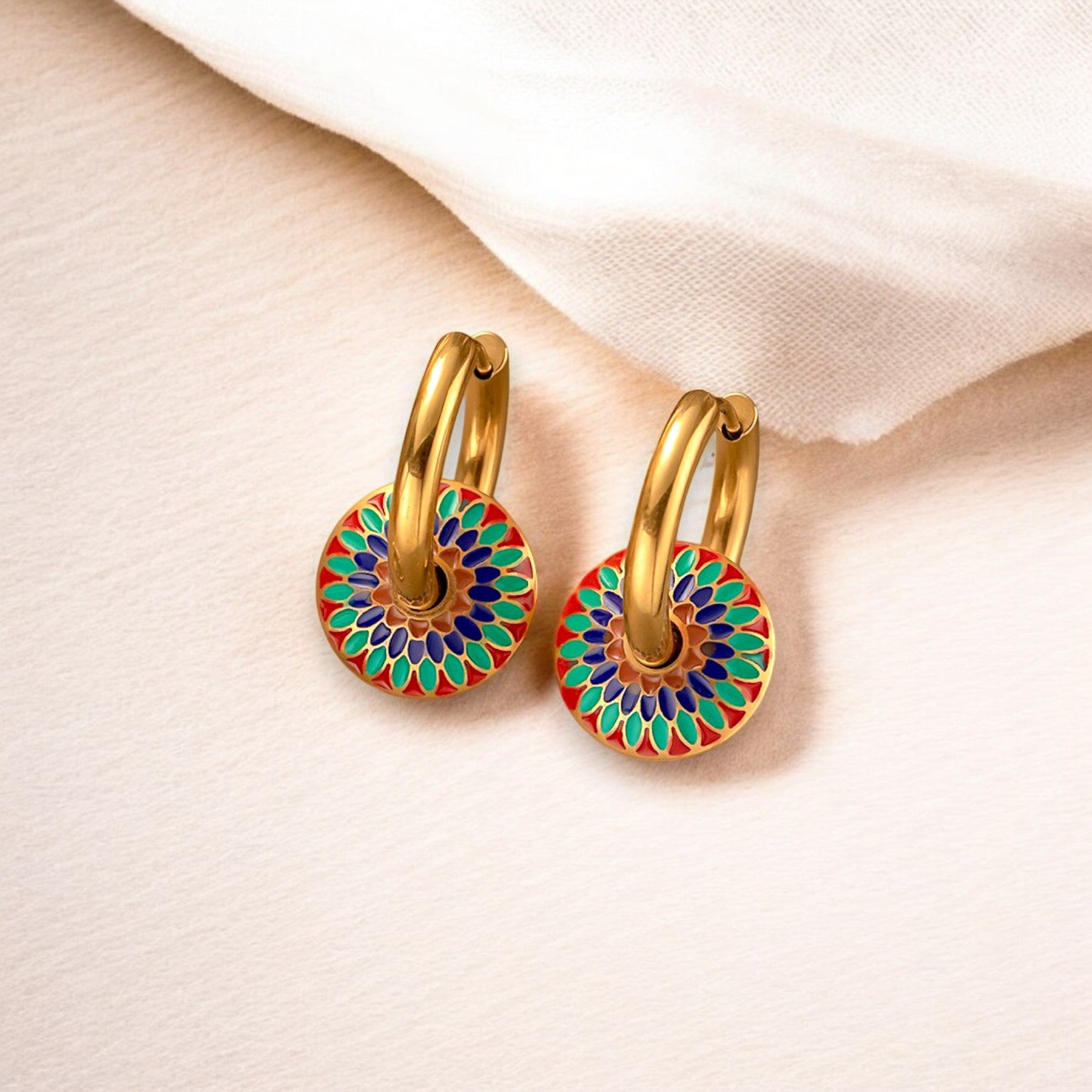 Retro Enamel 18K Gold Plated Hoop Earrings, crafted in stainless steel for a durable, hypoallergenic wear. Featuring a 2.5cm x 1.7cm design, these earrings offer a luxurious yet lightweight feel (10g). Perfect for any occasion, these earrings add a timeless elegance to your outfit. Tarnish-free, water-resistant, and designed for everyday wear, delivered in Sutra Designs' custom jewelry packaging