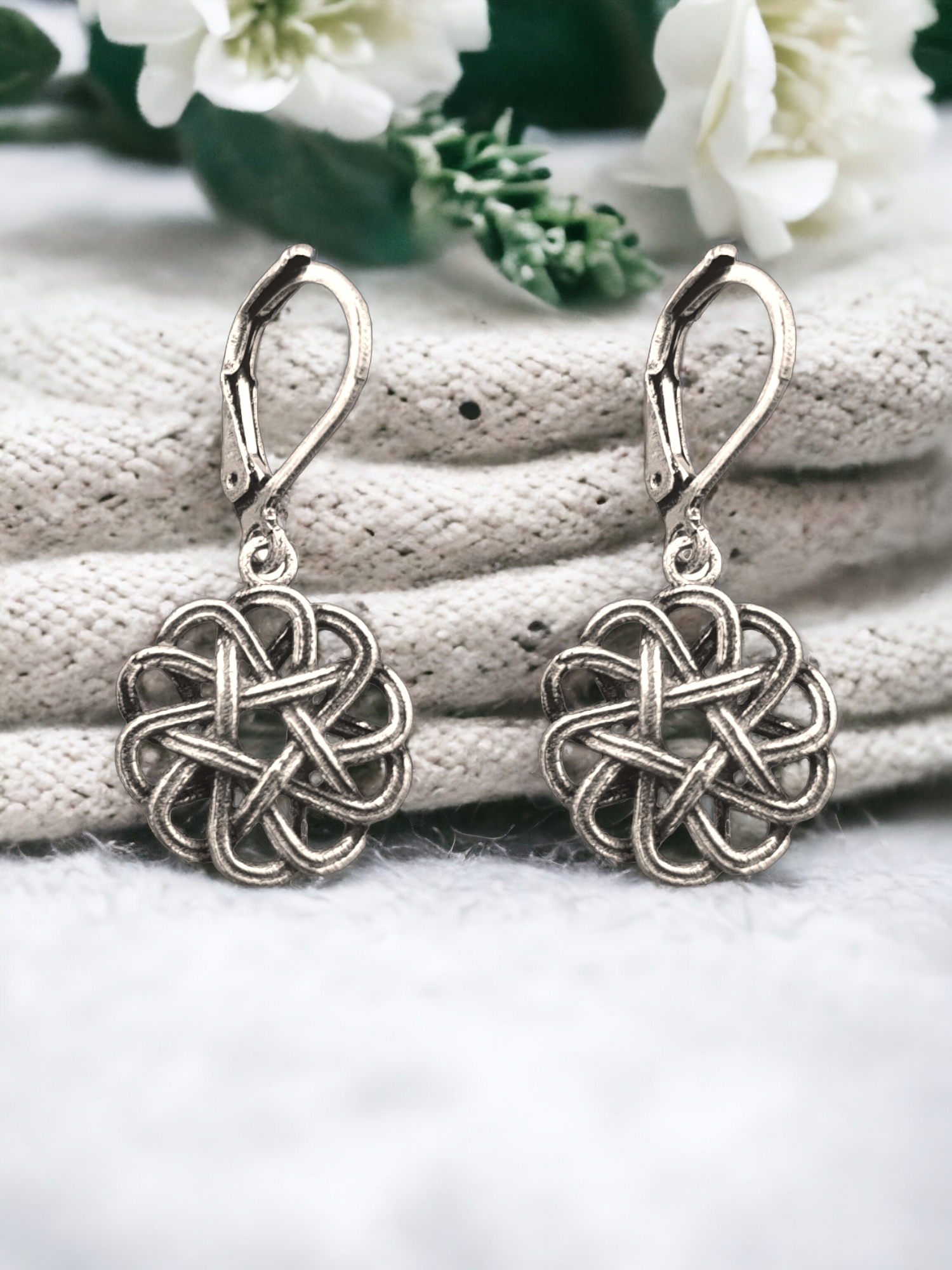 Krita Floral Charm Hoop Earrings in Antique Silver, crafted in brass with a 1.5cm charm size and a total weight of 4.1g. Skin-friendly material delivered in Sutra Designs' custom packaging