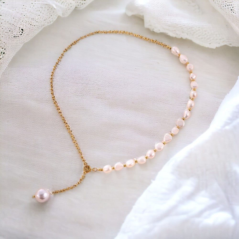 Freshwater Pearl Necklace, 18K Gold-Plated and crafted from titanium steel and pearls. Necklace length 52.5cm, with a total weight of 18g. Hypoallergenic, tarnish-free, water-resistant, and delivered in Sutra Designs' custom packaging